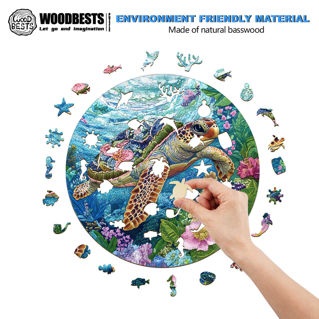 Hand placing a piece in an embroidered turtle wooden jigsaw puzzle, made from natural basswood, featuring colorful marine life.