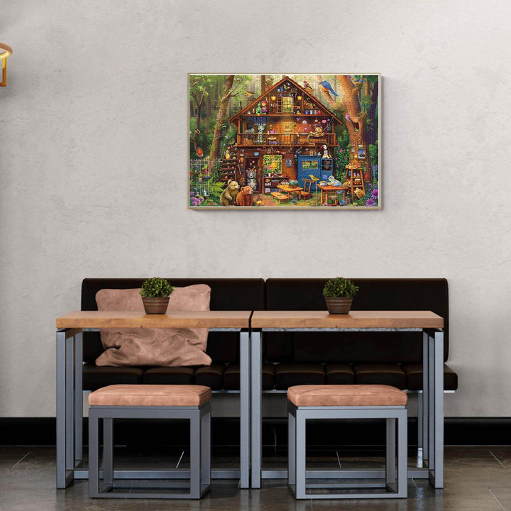 Cozy dining area with a 'Cabin in the Woods' puzzle artwork on the wall, perfect for a relaxing atmosphere.
