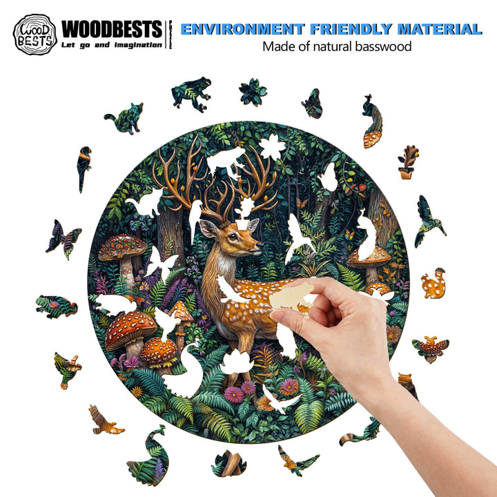 Person solving a wooden jigsaw puzzle featuring a forest scene with deer and wildlife, showcasing eco-friendly materials.