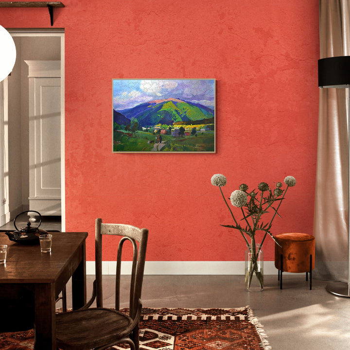 Vibrant landscape painting by Alexander Shandor, enhancing a cozy dining space with warm colors.
