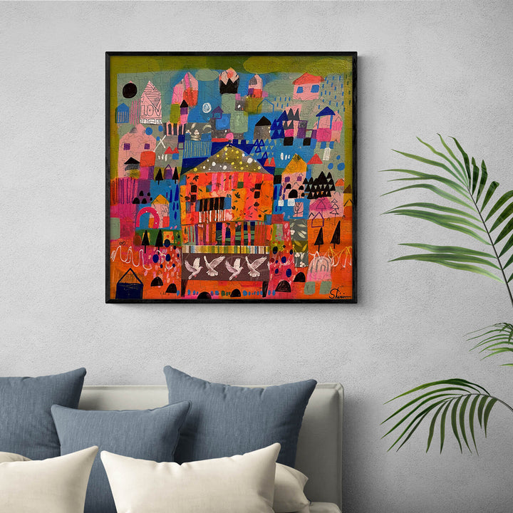 Colorful abstract artwork titled 'This Shall Pass' by Shirin Moarefi, displayed on a wall above a couch.