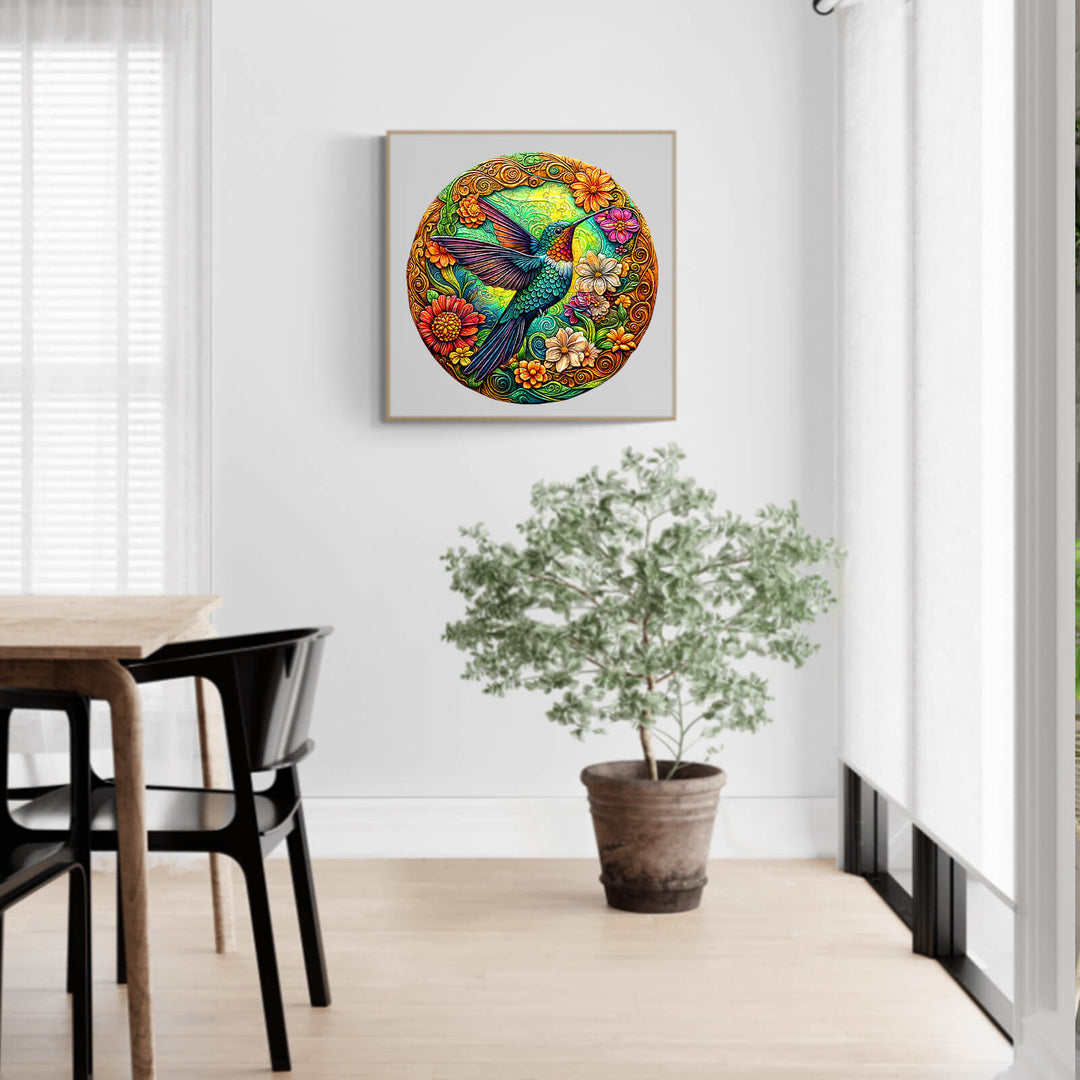 Colorful vintage hummingbird puzzle framed on a wall in a bright room with greenery and modern furniture.