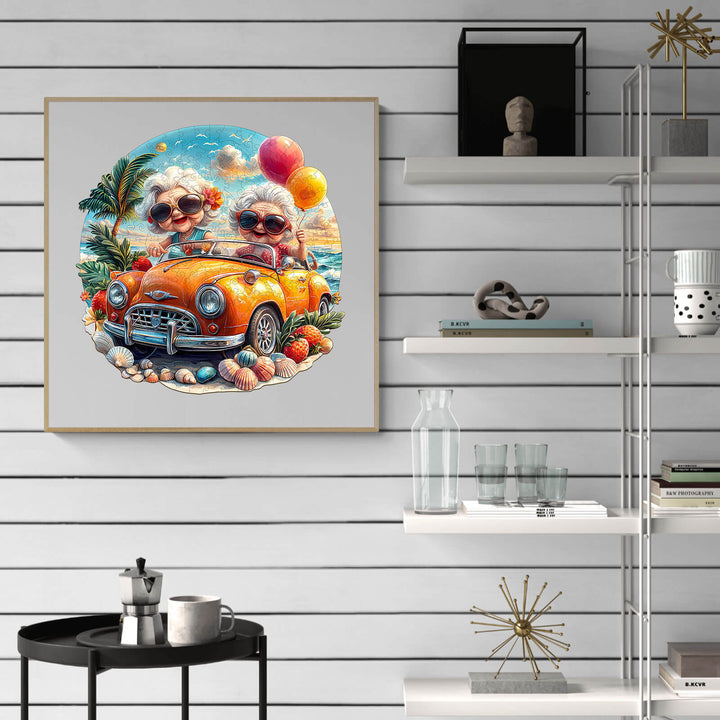 Happy grandma and grandpa driving a vintage car with balloons in a tropical setting, colorful jigsaw puzzle design.