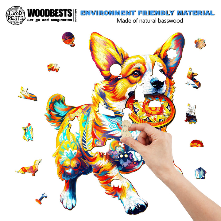 Hand placing a piece in a colorful wooden jigsaw puzzle of a dog playing with toys, made from natural basswood.