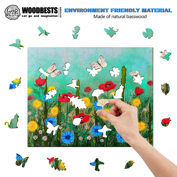 Hand assembling a colorful environment-friendly wooden puzzle of flowers and butterflies made from natural basswood.