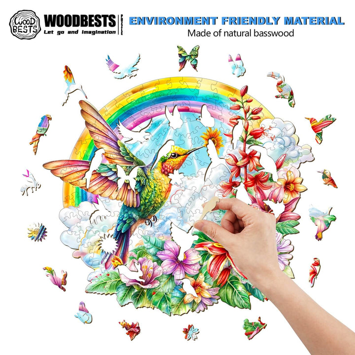 Person assembling an Angel Hummingbird wooden jigsaw puzzle, showcasing vibrant colors and eco-friendly material.