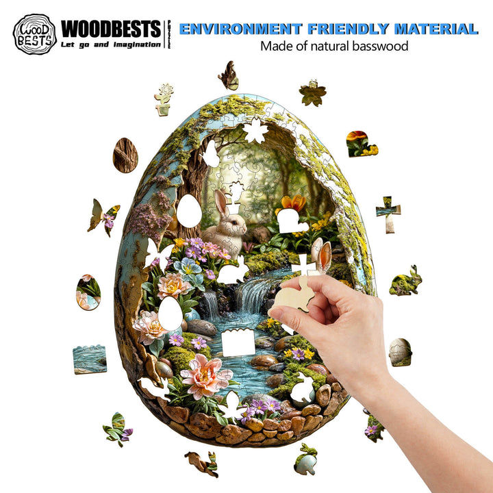 Hand assembling 3D Wonderland Easter wooden jigsaw puzzle made from natural basswood, featuring a serene garden theme.