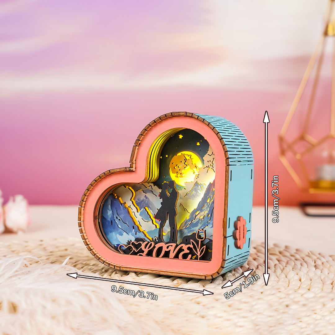 Heart-shaped 3D wooden puzzle night light featuring a couple under a moonlit sky, showcasing love and romance.