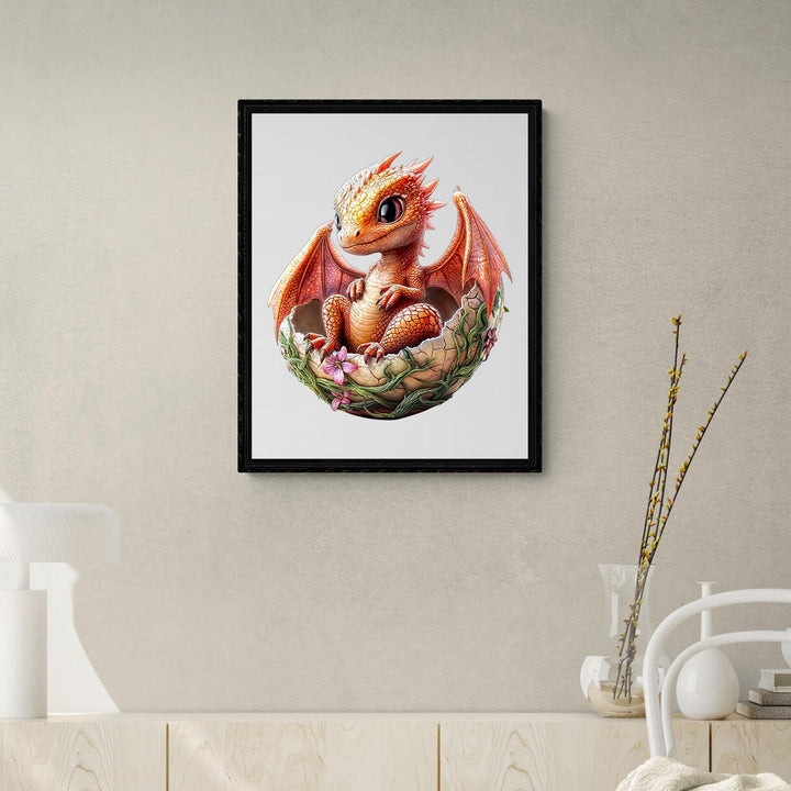 Whimsical Dragonet illustration in a frame, showcasing a cute dragon sitting in a nest among flowers.