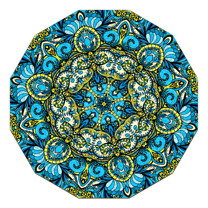 Intricate blue and yellow doodle art mandala design by Lori Anne McKague, showcasing detailed patterns and vibrant colors.
