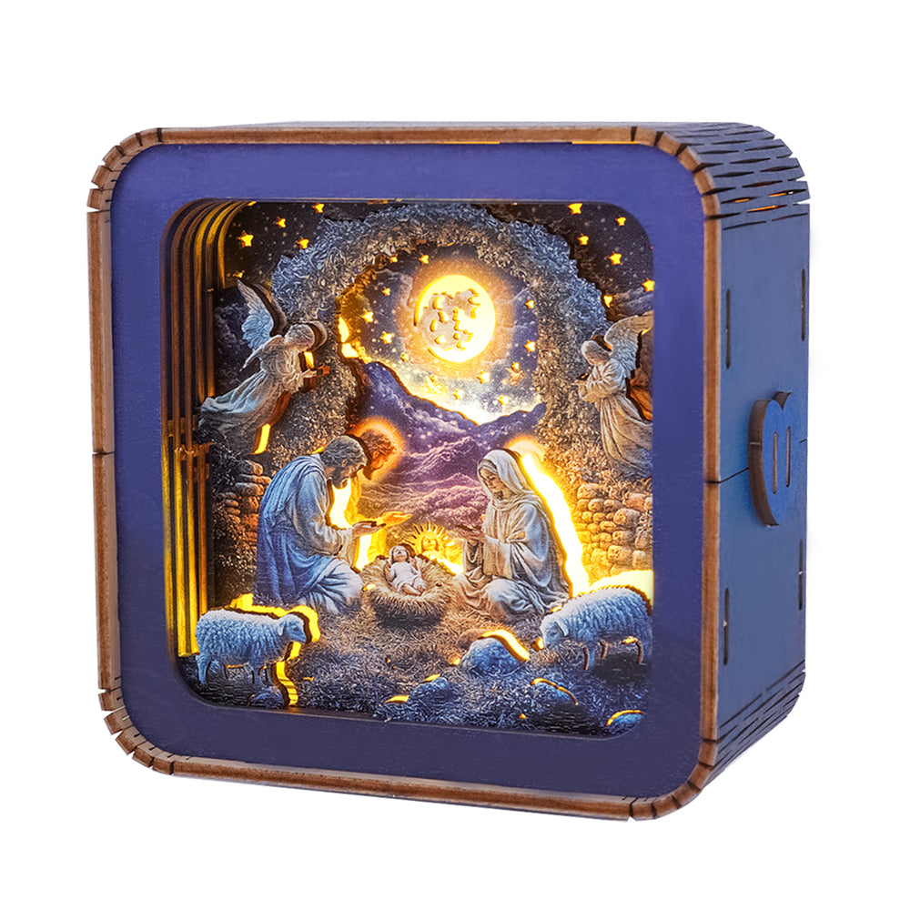 3D wooden puzzle night light featuring nativity scene with angels, Mary, Joseph, and baby Jesus illuminated against a starry background.