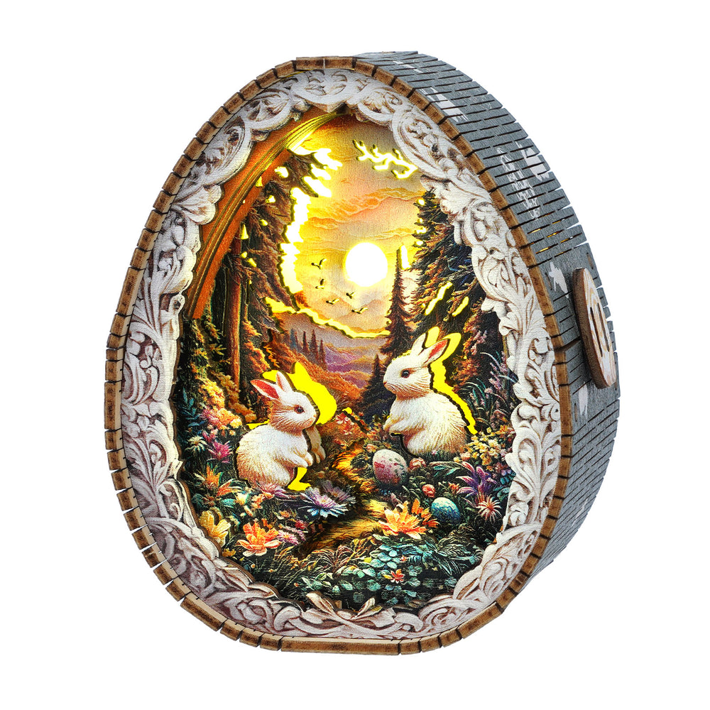 3D wooden puzzle night light featuring rabbits in a vibrant forest scene, beautifully illuminated.
