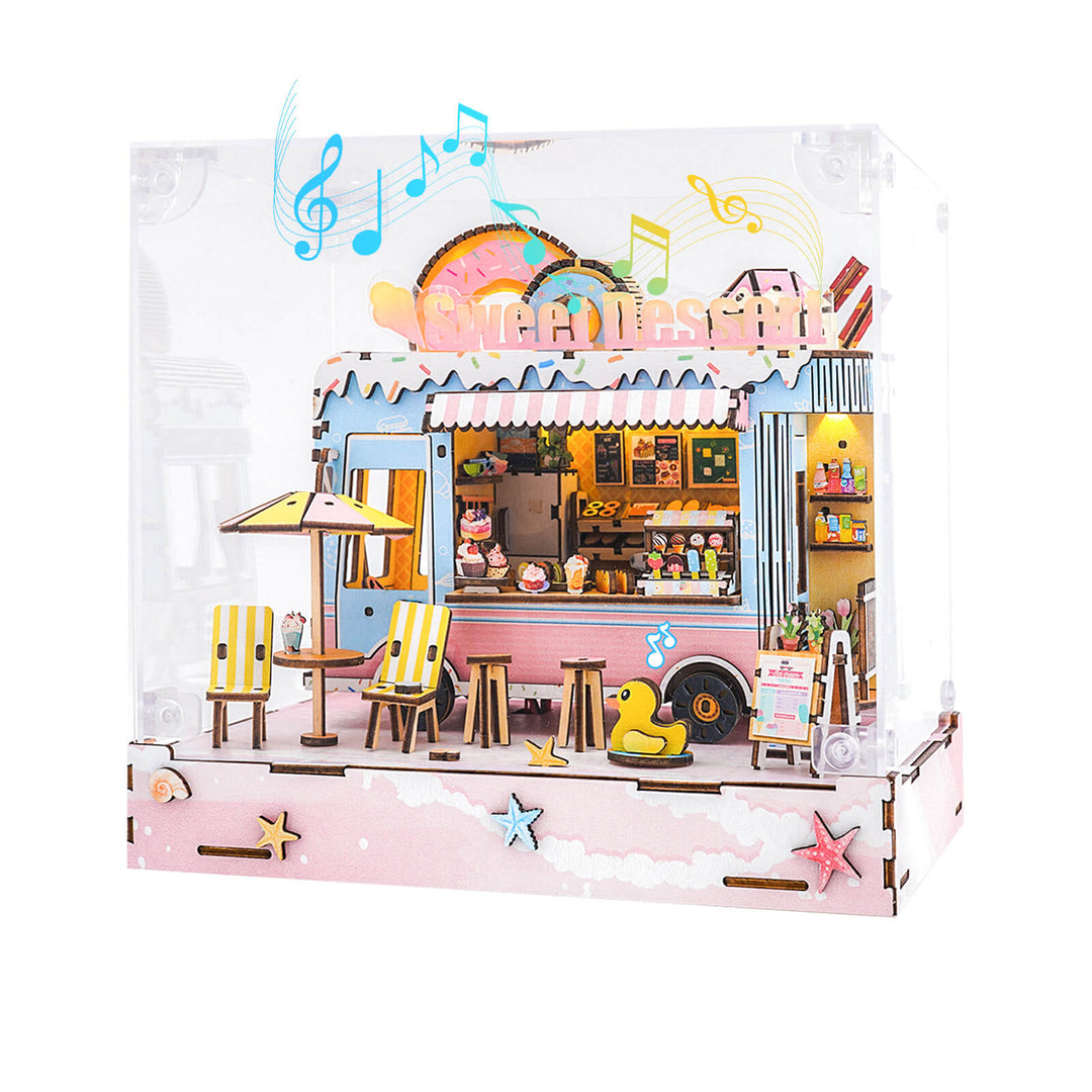 Colorful miniature dessert cart 3D wooden puzzle kit with outdoor seating and musical elements.