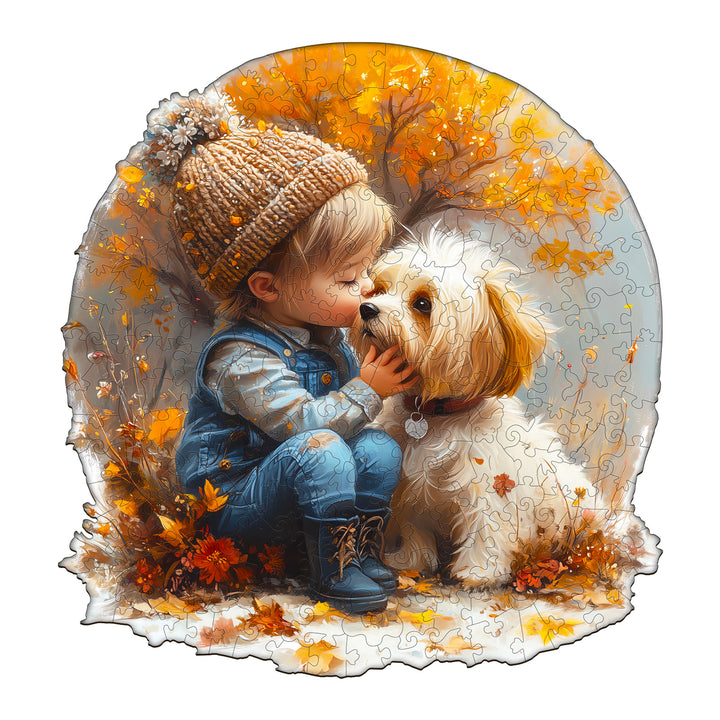 A child in a hat kisses a fluffy dog amidst autumn leaves in this colorful wooden jigsaw puzzle design.