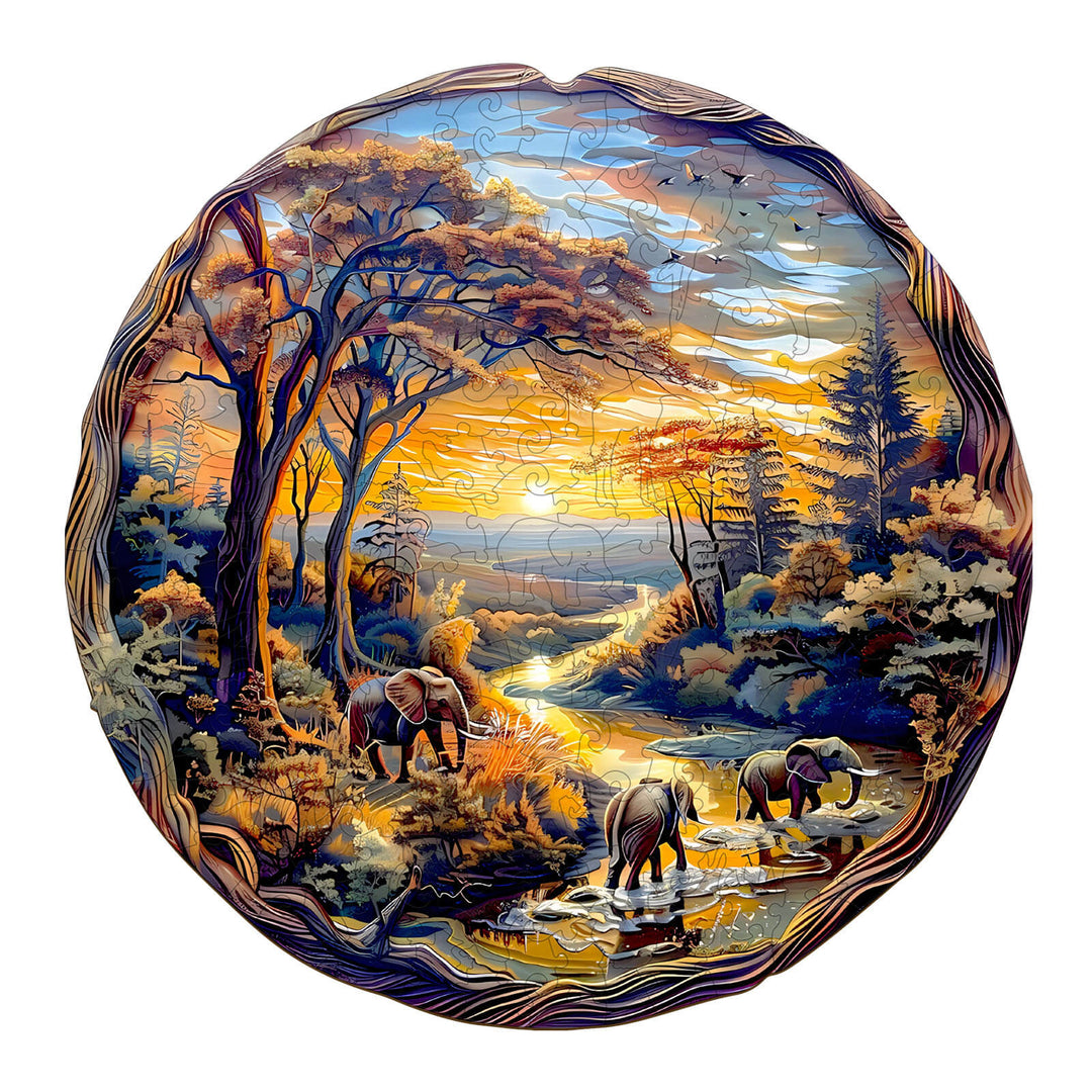 Elephant at Sunset wooden jigsaw puzzle depicting elephants by a stream in a scenic sunset landscape.