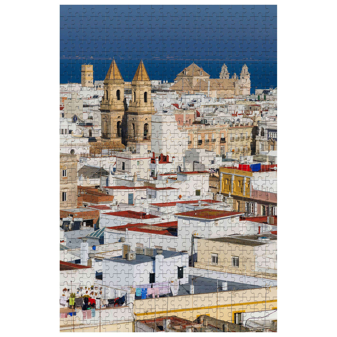 Exotic Town 500/1000 piece puzzle showcasing a scenic view of white buildings and towers under a blue sky.