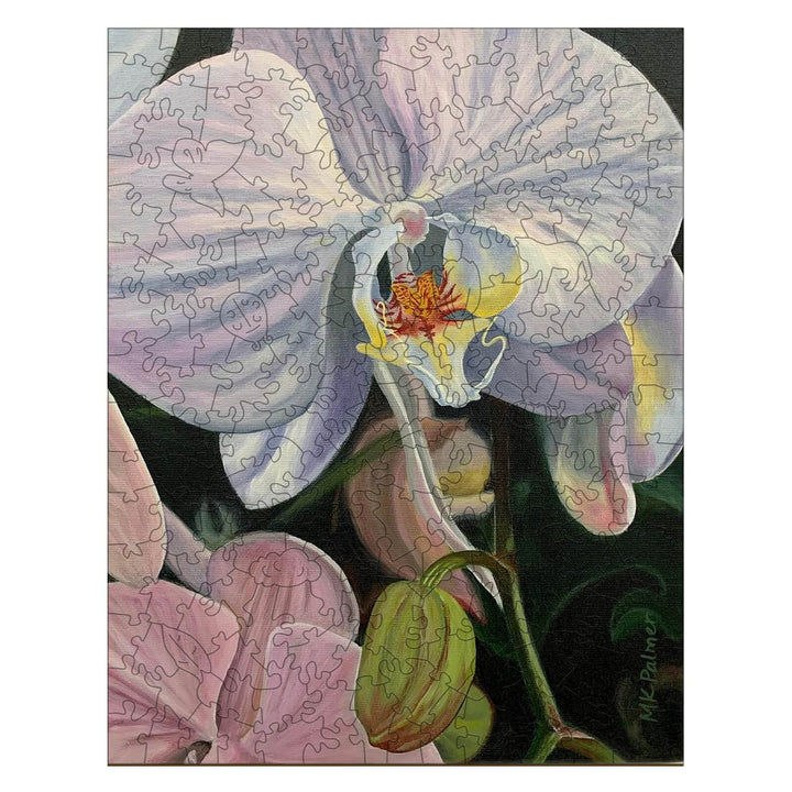 Colorful orchid puzzle artwork by artist Marianne K Palmer, showcasing delicate flowers and vibrant colors.