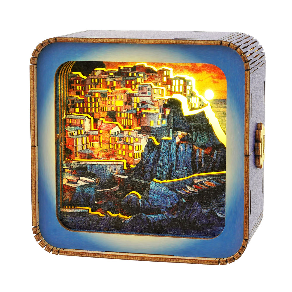 Golden Coast Village Kit 3D wooden puzzle night light showcasing a picturesque sunset over a coastal village.