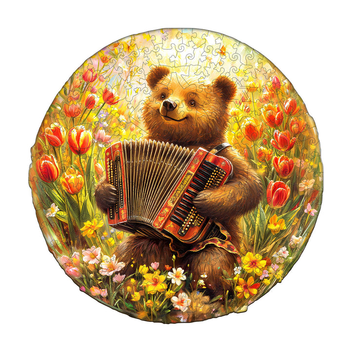 Melody Meadow wooden jigsaw puzzle featuring a bear playing accordion in a vibrant flower field.
