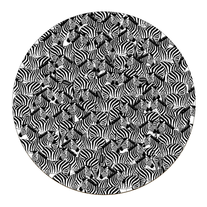 Seek and find puzzle featuring a circular arrangement of intricately designed zebra heads in black and white.