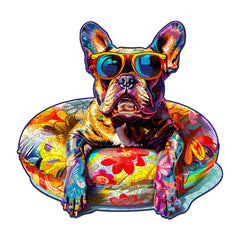 Colorful French Bulldog puzzle in sunglasses, lounging on a floral float, perfect for jigsaw puzzle lovers.