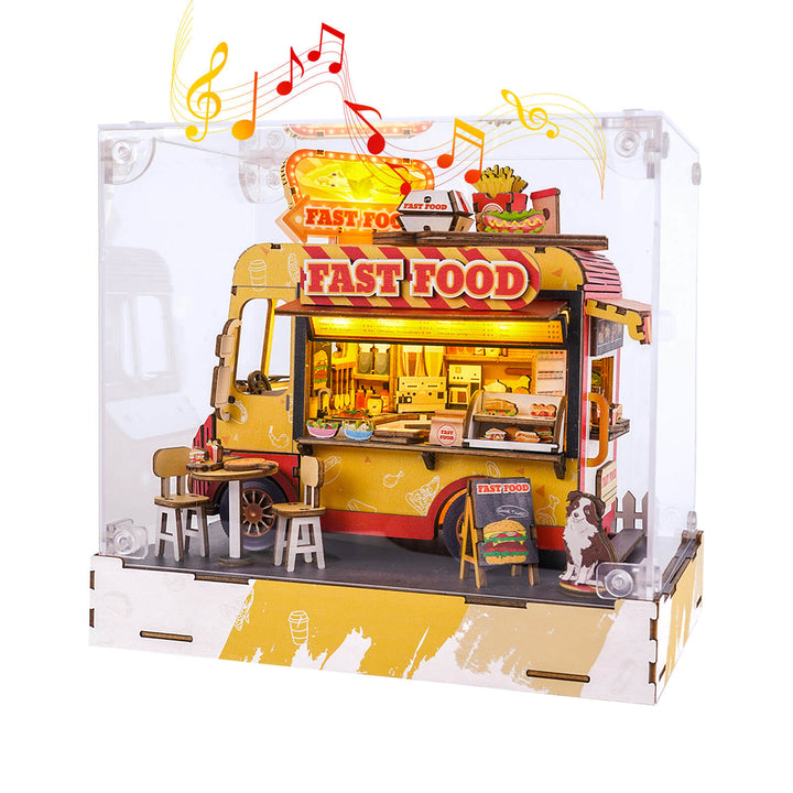 Colorful DIY 3D wooden fast food cart puzzle in display case with detailed features and musical notes.
