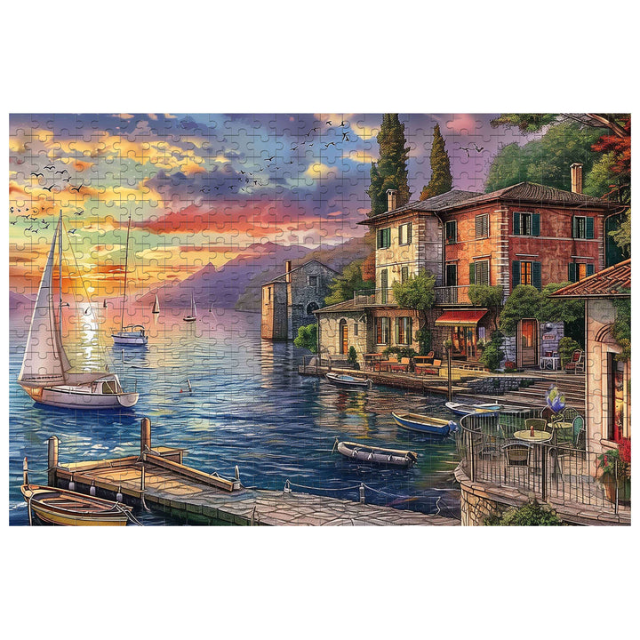 Golden Twilight Haven 500/1000 piece puzzle showcasing a serene lakeside scene at sunset with boats and charming houses.