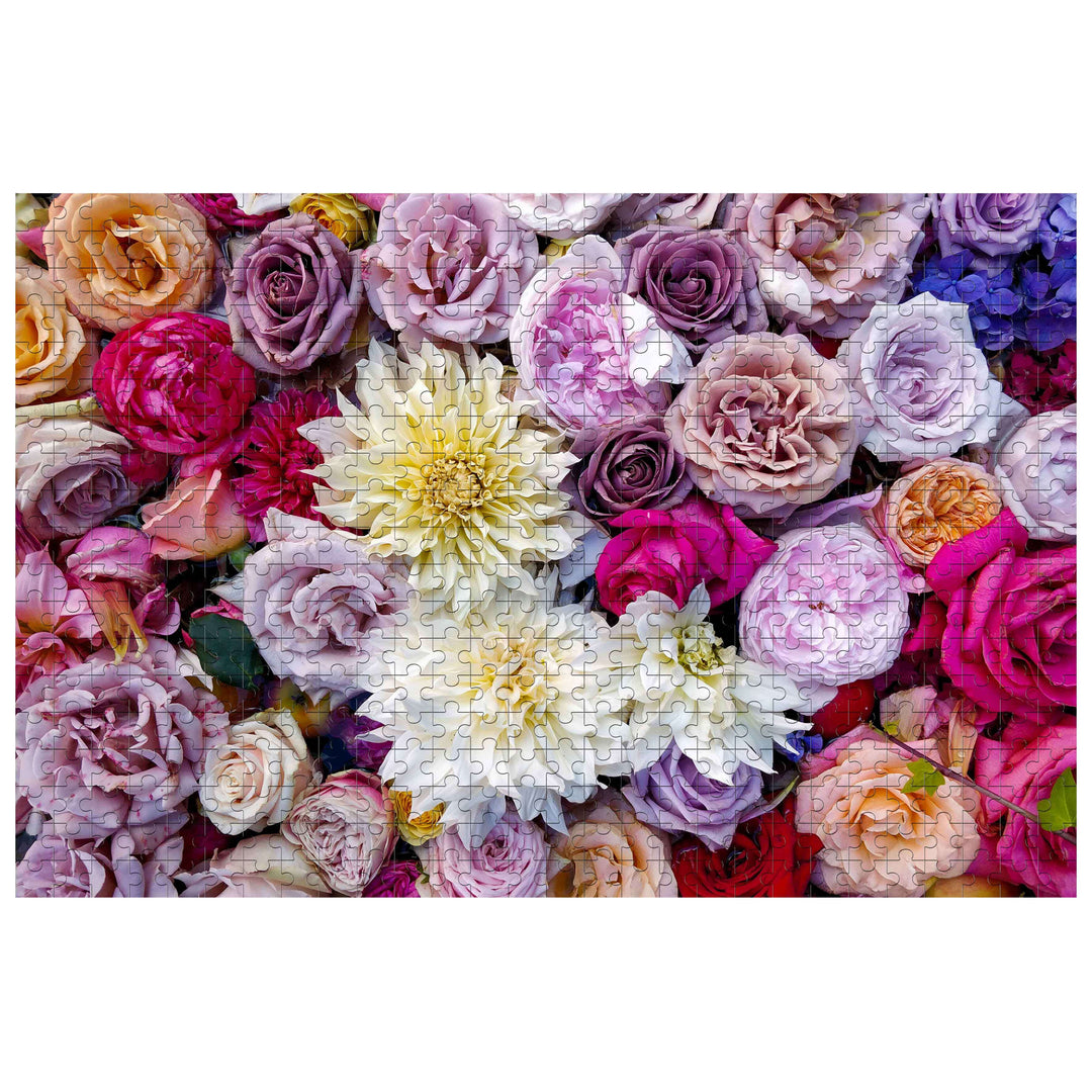 Close-up of colorful flowers in a jigsaw puzzle featuring a sea of roses and daisies, perfect for puzzle enthusiasts.
