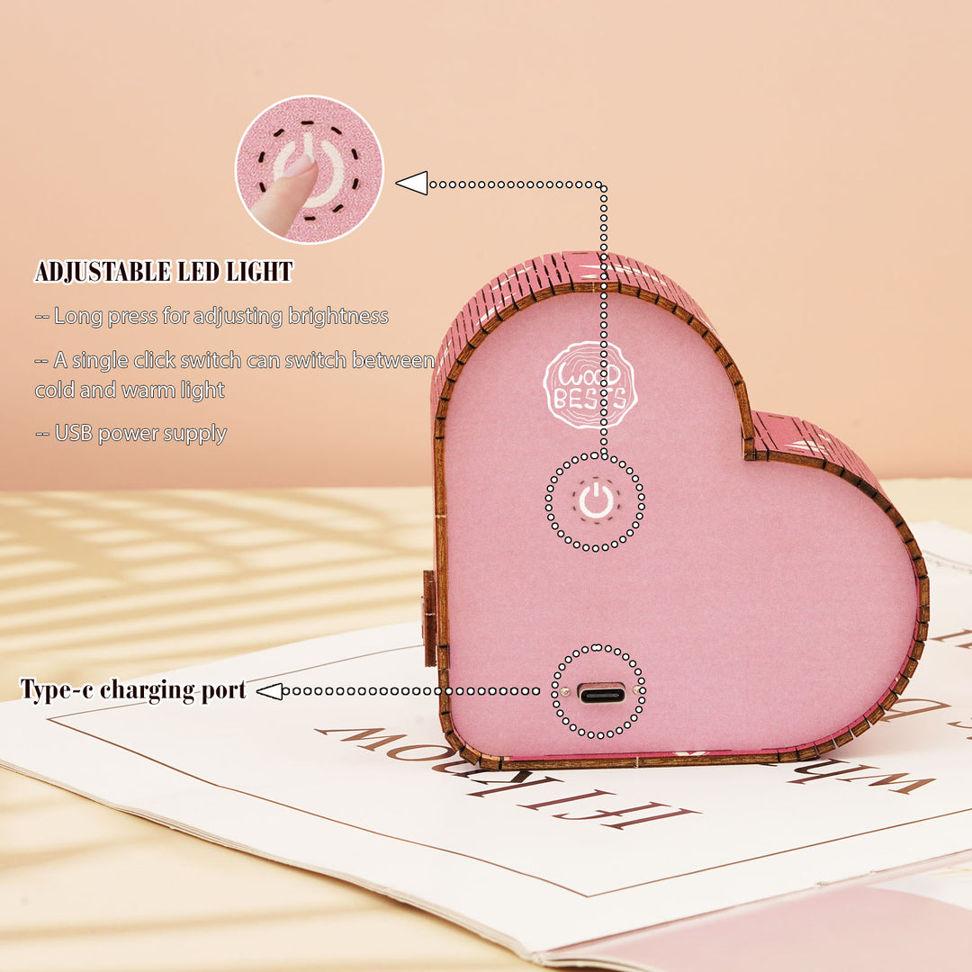 Close-up of the Dreamy Mine Cave Kit heart-shaped 3D wooden puzzle night light showing adjustable LED settings and Type-C charging port.