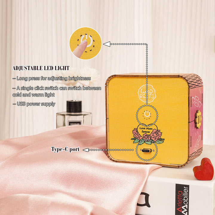 Close-up of the adjustable LED light features on a 3D wooden puzzle night light kit, highlighting USB and brightness controls.