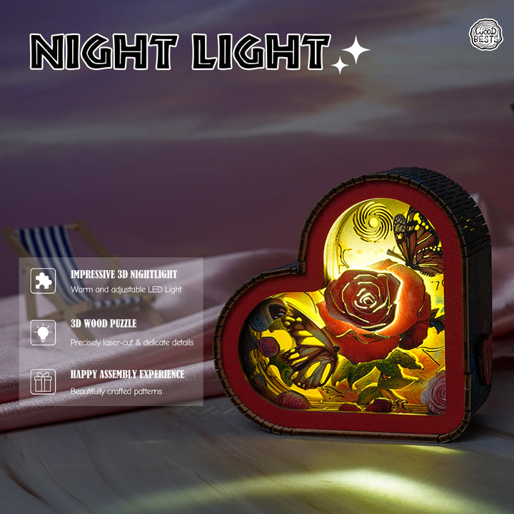 Heart-shaped 3D wooden puzzle night light featuring roses and butterflies, glowing warmly in a cozy setting.