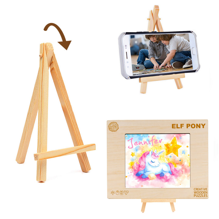 Wooden easel display stand featuring a custom children's puzzle with a unicorn illustration.