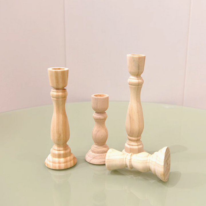 Nordic vintage wooden candle holders made of natural beech wood for creating a warm atmosphere.