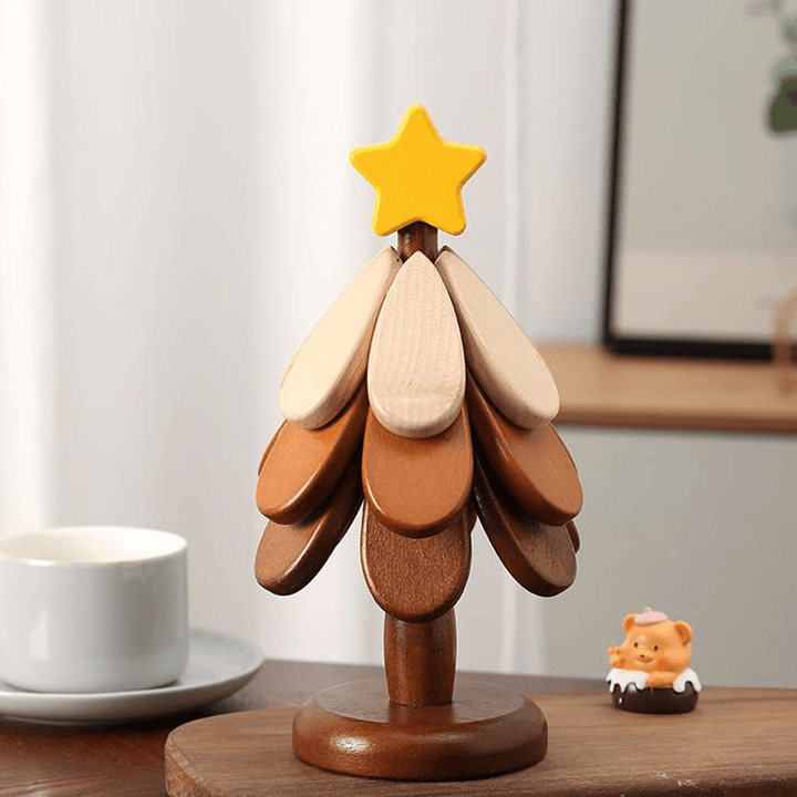 Wooden Christmas tree decoration with colorful leaves and yellow star, adding charm to any festive setting.
