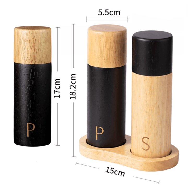 Sea salt and pepper grinder combo set in natural rubber wood, showcasing elegant design and functionality on a dining table.