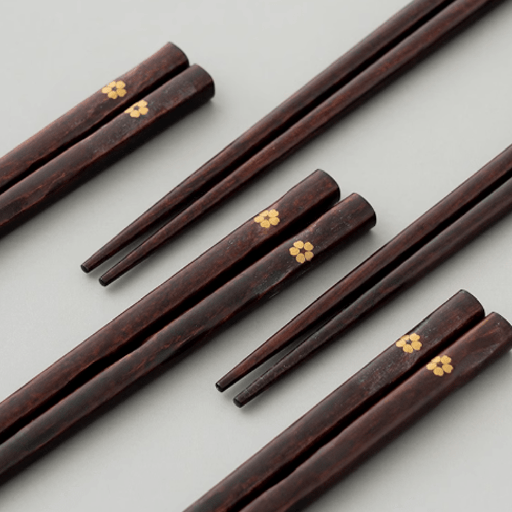 Non-slip Sakura pointed-tip wooden chopsticks set featuring cherry blossom designs on warm jujube wood.