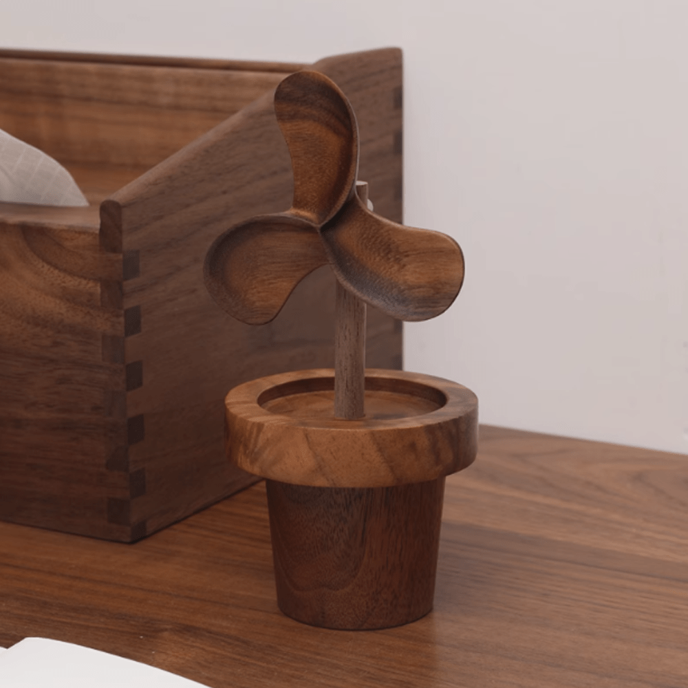 Wooden aromatherapy diffuser in a flower pot design, crafted from walnut wood for natural elegance.