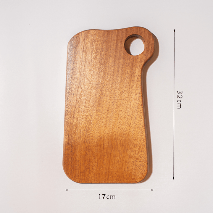 Ring-shaped mini cutting board made of walnut wood, 32cm x 17cm, eco-friendly and BPA-free for baby food preparation.