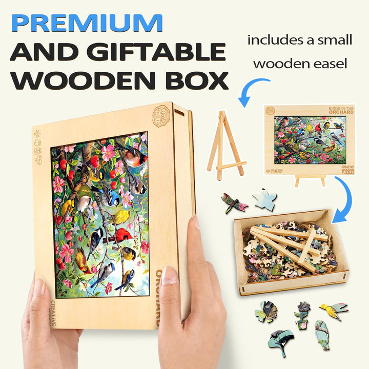 Premium Birds in the Orchard wooden jigsaw puzzle in a gift box with easel and colorful bird pieces.