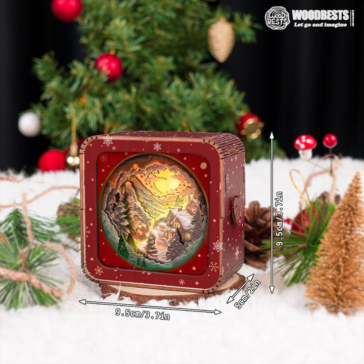 Snow Mountain Hut Kit 3D wooden puzzle night light displayed with Christmas decorations, showcasing intricate design and warm glow.