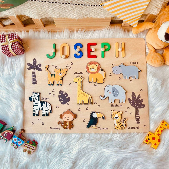 Personalized jungle animal name puzzle for children featuring colorful animal figures and letters spelling 'JOSEPH'