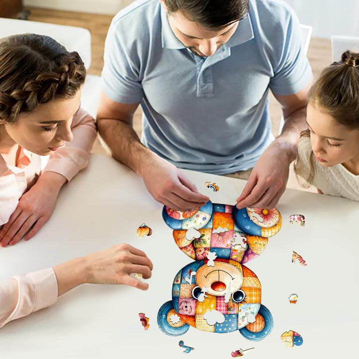 Family enjoying together while solving a colorful Patchwork Bear wooden jigsaw puzzle on a table.