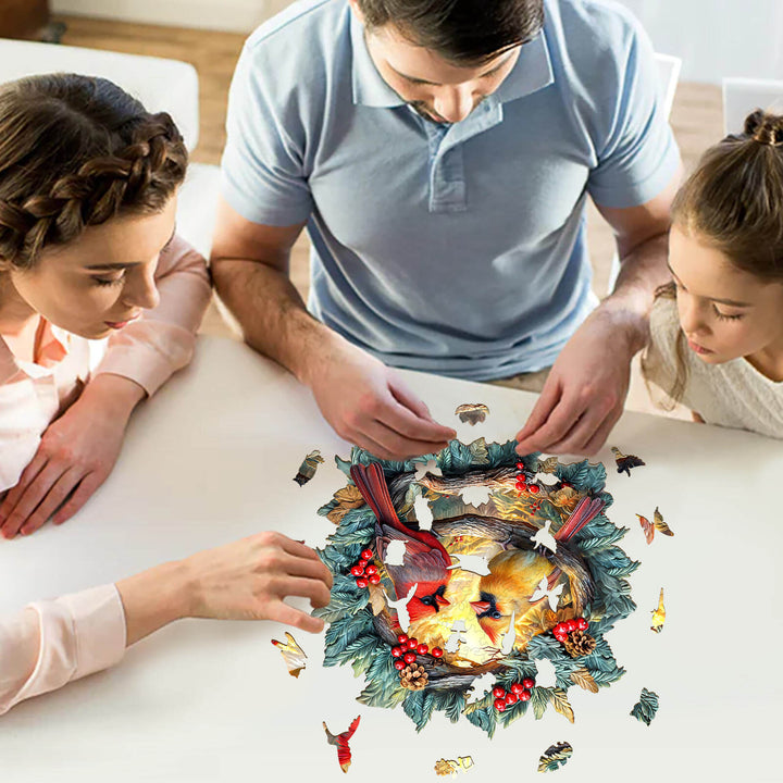 Family enjoying the 3D Northern Cardinal Wooden Jigsaw Puzzle on a bright table with vibrant pieces.