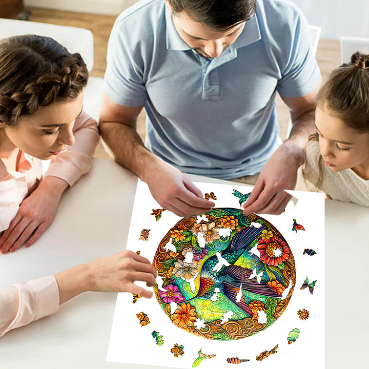 Family enjoying the Vintage Hummingbird wooden jigsaw puzzle on a table, enhancing focus and cognitive skills.