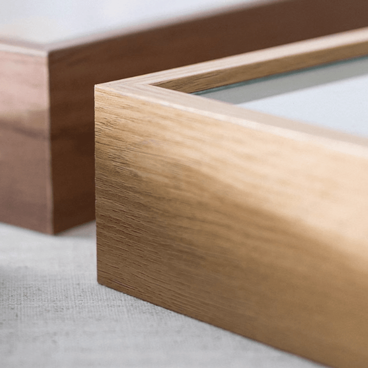 Close-up of deep inner frame specimen photo frames in natural wood finish, perfect for displaying art and specimens.