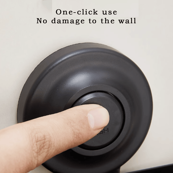 Close-up of a hand pressing a suction cup button for easy installation without wall damage.