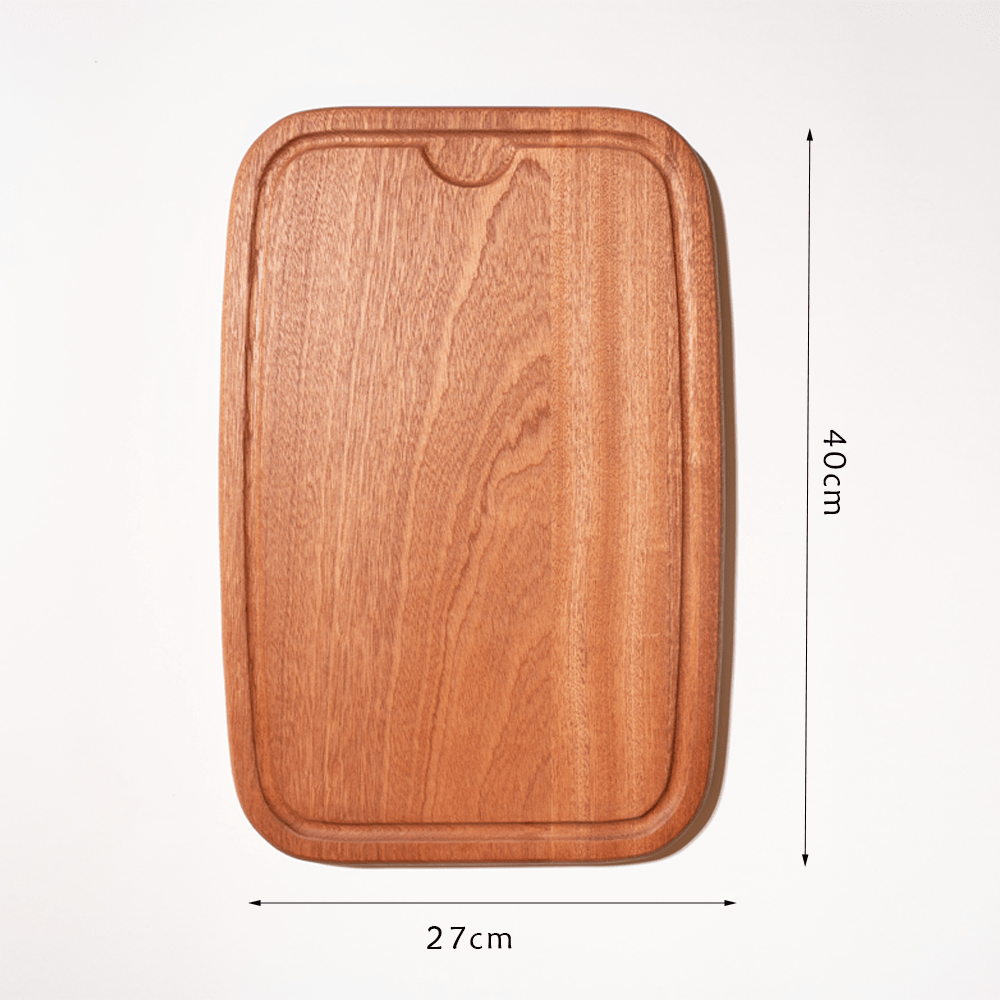 Multi-functional cutting board with built-in juice groove, crafted from natural ebony, 27x40 cm, perfect for daily cooking.