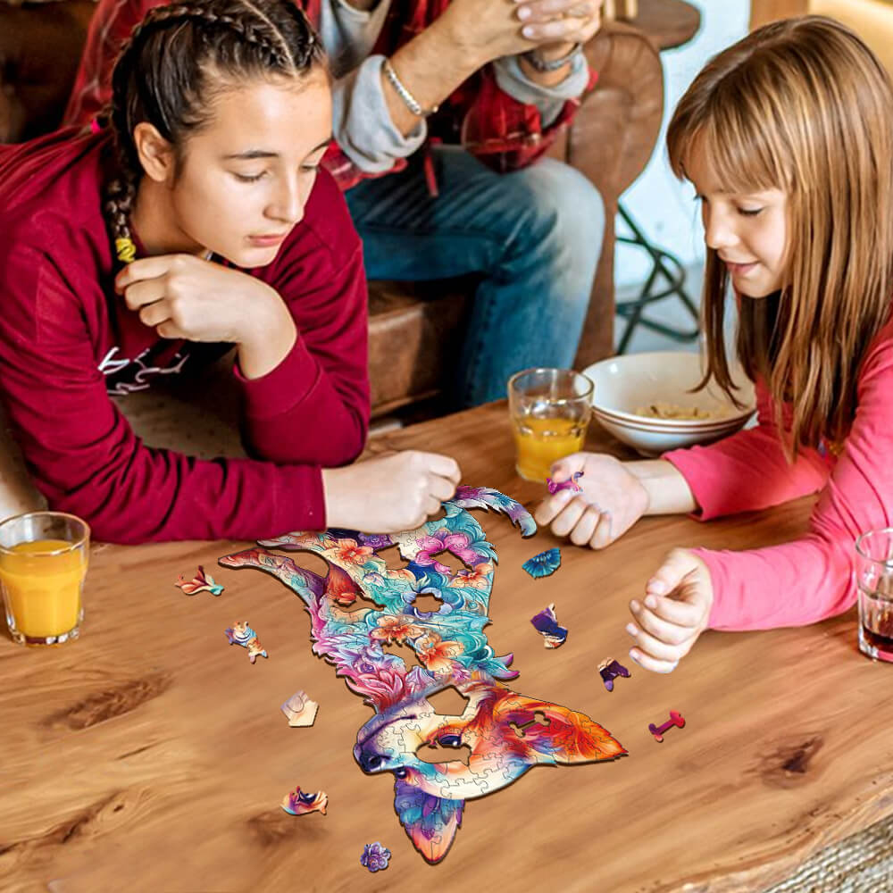 Two girls solving a Cute Puppy wooden jigsaw puzzle on a wooden table, fostering focus and cognitive skills through play.