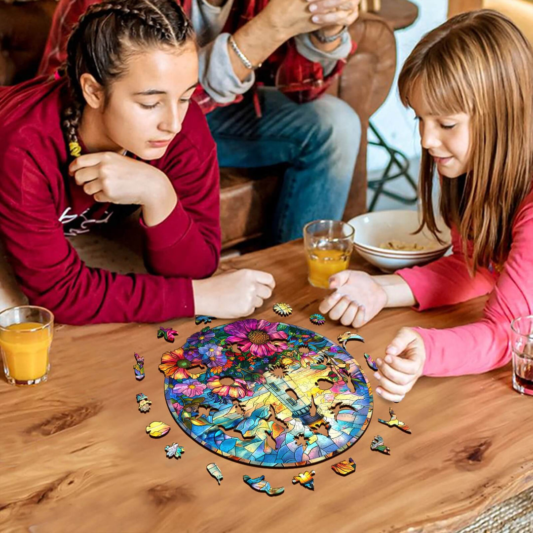 Two girls enjoying a Stained Glass Lighthouse jigsaw puzzle on a table, enhancing focus and cognitive skills.