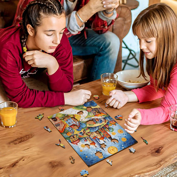 Two girls working on a colorful puzzle titled Princess Tale by Pietro Gallo, with drinks and family in a cozy setting.